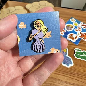 Girl in the Sea enamel pin