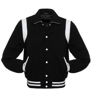 May include: A black varsity jacket with white sleeves and a white stripe around the bottom. The jacket has a button closure and two pockets.