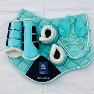 Handmade Customizable top Quality Saddle Pad Set – CYAN with Brushing Boots, Bell Boots & Ear Net