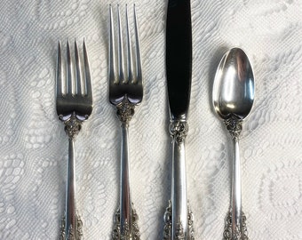 1 Place Setting of 4 solid silver Grand Baroque utensils