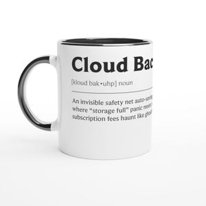 May include: White ceramic mug with a black interior and handle. The mug features the text "Cloud Bac" in a bold, black font, along with a definition. A humorous gift idea for tech enthusiasts.