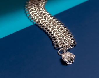 Ipomoea Chainmaille Bracelet: sterling silver, with moonstone flower box clasp