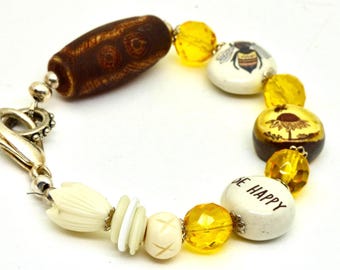 Pulsera floral Bee Happy: Joyería artística con cuentas y un toque de fantasía.