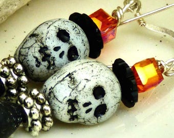 Zombie skull earrings with orange crystals, glam skeleton dangles