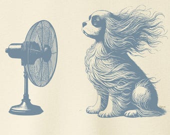 May include: Cream-colored t-shirt featuring a blue illustration of a dog with wind-blown fur facing a blue fan. The fan is turned on, creating the wind effect. The shirt has a crew neck and short sleeves. The brand logo "Taco Dog" is on the upper right.