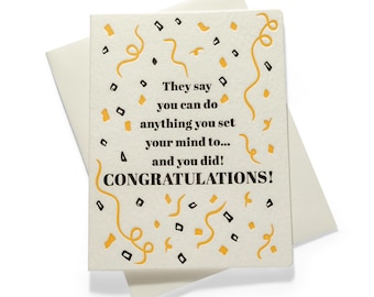 ¡Felicidades! ¡Decídete! / Multiusos / Tarjeta de felicitación impresa en tipografía.