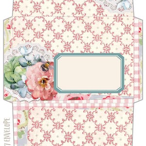 May include: A 5x7 envelope template featuring a cream background with a repeating red damask pattern. The design includes floral clusters with pink and blue flowers, green leaves, and bees, along with a white doily accent and a blank rectangular label.