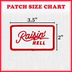 May include: A rectangular white patch with a red border and the words "Raisin' HELL" embroidered in red. The patch measures 3.5 inches by 2 inches. The text "PATCH SIZE CHART" is at the top.