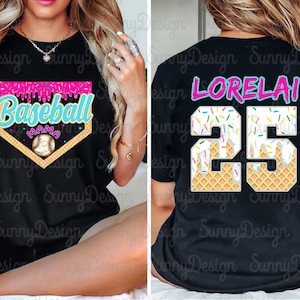 May include: Black t-shirt with a pink, white, and blue baseball-themed design that says "Baseball Mama" and a baseball graphic. The back of the shirt has a white, blue, and pink ice cream cone design with the name "LORELAI" and the number "25" on it.