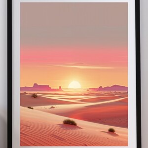 Könnte beinhalten: Gerahmter Druck einer Wüstenlandschaft bei Sonnenuntergang. Das Bild zeigt wellenförmige Sanddünen, entfernte Mesas und einen lebendigen Himmel mit Rosa-, Orange- und Gelbtönen. Der Text "Instant Download" befindet sich unten.