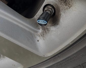 Tapa de vástago de válvula con el logotipo de Ford
