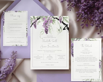 May include: Wedding invitation suite featuring a main invitation, RSVP card, and details card. The design includes purple wisteria illustrations and elegant typography. The suite is set against a soft, satin background with matching envelopes.