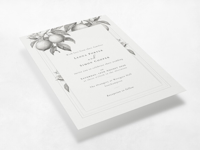 La Scorza botanical lemon wedding invitation shown at an angle