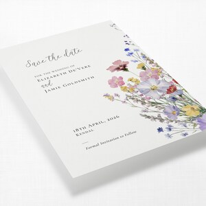Meadow Blossom wildflower wedding save the date card shown at an angle