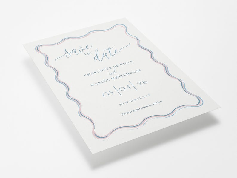 The Wiggle collection pastel wavy border wedding save the date shown at an angle