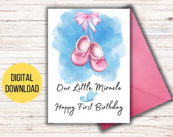 May include: A digital download of a printable card with a watercolor background and pink baby shoes. The card says "Our Little Miracle Happy First Birthday".