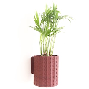 Wall-mounted flower pot with attractive 3D printed design