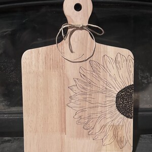 Wood burned sunflower cutting board