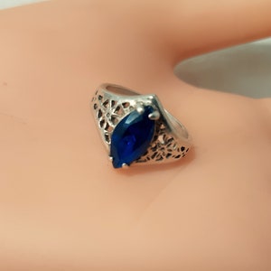 Vintage Silver Solitaire Ring with Blue Stone in Size 8. It Looks Like Sterling But is Unmarked. The Setting Has a Lacey Open Design. D33 image 5