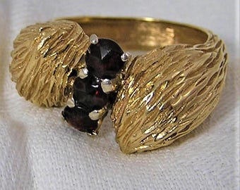 Vintage 14K Gold and Garnet Karbra Ring. It is a Size 9 3/4 and Weighs 10 Grams. There are 3 Stones About 5mm Each with Rose Type Cut. (D27)