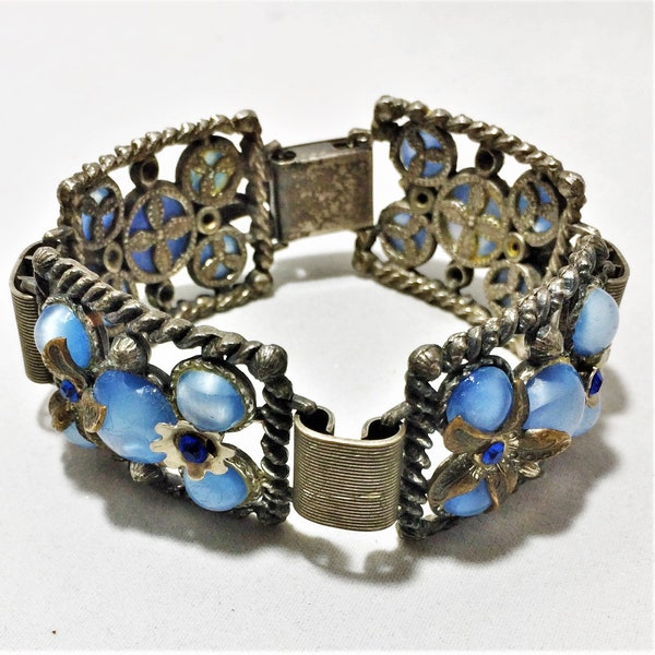 Vintage 4 Link Bracelet with Powder Blue Moonglow Stones and Metal Flowers With Blue Rhinestone Centers Set in Pewter Colored Links. (D31)