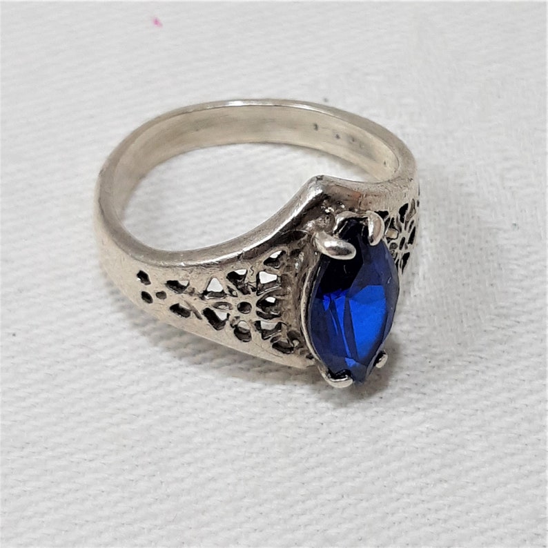 Vintage Silver Solitaire Ring with Blue Stone in Size 8. It Looks Like Sterling But is Unmarked. The Setting Has a Lacey Open Design. D33 image 1