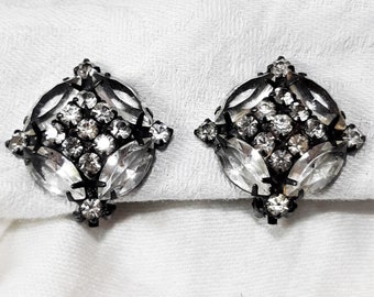 Vintage Black and Crystal Clip On Earrings. They Have  Black Japanned Metal Settings and Measure 1 1/4 Inches in Diameter. Classy Look (D37)