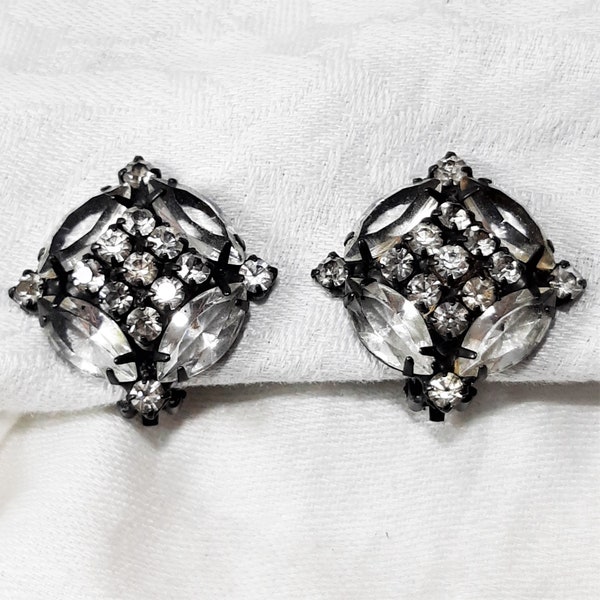 Vintage Black and Crystal Clip On Earrings. They Have  Black Japanned Metal Settings and Measure 1 1/4 Inches in Diameter. Classy Look (D37)