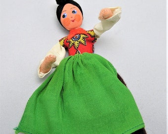 Vintage BAPS Doll Puppet. Woman International Doll in Red and Green. Black Hair. Measures 4 1/2 Inches Plus the Metal Wire Support. (BB)