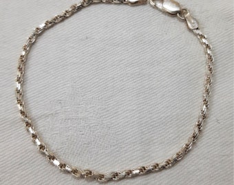 Vintage Sterling Silver Rope Chain Bracelet with Lobster Clasp Measures 7 1/4 Inches Long and is Marked 925 and Made in Italy. (D16)