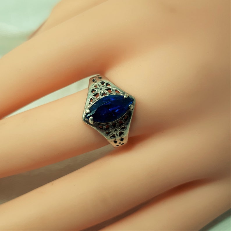 Vintage Silver Solitaire Ring with Blue Stone in Size 8. It Looks Like Sterling But is Unmarked. The Setting Has a Lacey Open Design. D33 image 2