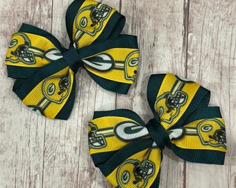 Green Bay Packers Football 3” Pigtail Hair Bow, so cute for her first football game.   NFL football bow.  Matches Green Bay Packers HairBow