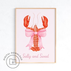 Op de afbeelding: Een aquarel-illustratie van een rode kreeft met een roze strik om zijn scharen. De tekst "Salty and Sweet" staat onder de kreeft.