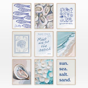May include: Nine framed art prints with a coastal theme. The prints feature illustrations of fish, oysters, seashells, beach scenes, and the words "Salty", "Meet me at the beach", and "summer". The last print says "sun. sea. salt. sand."