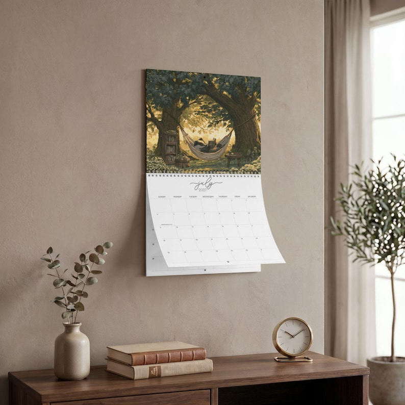 2027 wall calendar featuring cute woodland animals reading books, twelve
illustrated forest library scenes with fox, hedgehog, rabbit, squirrel, otter and
raccoon in hollow-tree bookshops and mushroom libraries, cozy cottagecore
storybook art, 12 month hanging calendar printed and shipped, book lover gift for
readers librarians and teachers, reading nook and home office decor
