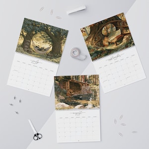 2027 wall calendar featuring cute woodland animals reading books, twelve
illustrated forest library scenes with fox, hedgehog, rabbit, squirrel, otter and
raccoon in hollow-tree bookshops and mushroom libraries, cozy cottagecore
storybook art, 12 month hanging calendar printed and shipped, book lover gift for
readers librarians and teachers, reading nook and home office decor
