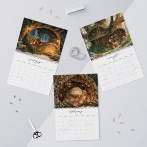 2027 wall calendar featuring cute woodland animals reading books, twelve
illustrated forest library scenes with fox, hedgehog, rabbit, squirrel, otter and
raccoon in hollow-tree bookshops and mushroom libraries, cozy cottagecore
storybook art, 12 month hanging calendar printed and shipped, book lover gift for
readers librarians and teachers, reading nook and home office decor