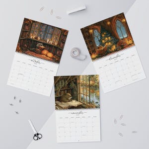 2027 wall calendar featuring cute woodland animals reading books, twelve
illustrated forest library scenes with fox, hedgehog, rabbit, squirrel, otter and
raccoon in hollow-tree bookshops and mushroom libraries, cozy cottagecore
storybook art, 12 month hanging calendar printed and shipped, book lover gift for
readers librarians and teachers, reading nook and home office decor