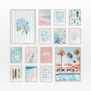 May include: A collection of framed wall art with a coastal theme. The art pieces feature beach scenes, seashells, palm trees, and floral designs in shades of blue, pink, and white. The frames are a light wood color.
