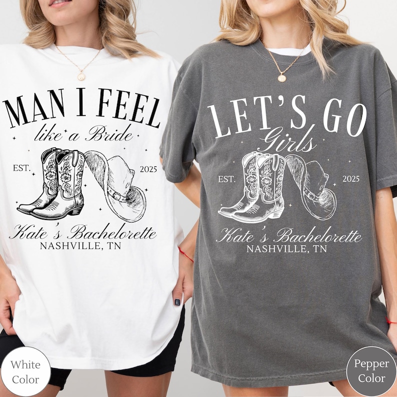 May include: White and pepper-colored t-shirts with text and illustrations. The white shirt reads "MAN I FEEL like a Bride" with cowboy boots and a hat. The pepper shirt says "LET'S GO Girls" with similar graphics. Both shirts say "Kate's Bachelorette, Nashville, TN."