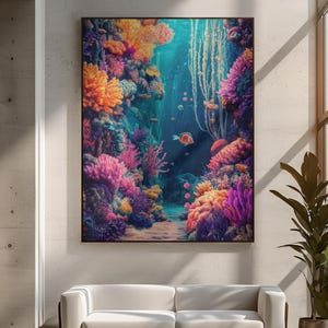 Pode incluir: Uma impressão de arte emoldurada retratando uma vibrante cena subaquática. A obra de arte apresenta recifes de coral coloridos em tons de laranja, rosa e roxo, com peixes nadando na água azul. A impressão é exibida acima de um sofá branco em uma sala de estar moderna.