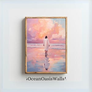 May include: A painting of a person in a white robe walking on a beach towards a pink and purple sunset. The water reflects the colors of the sky.