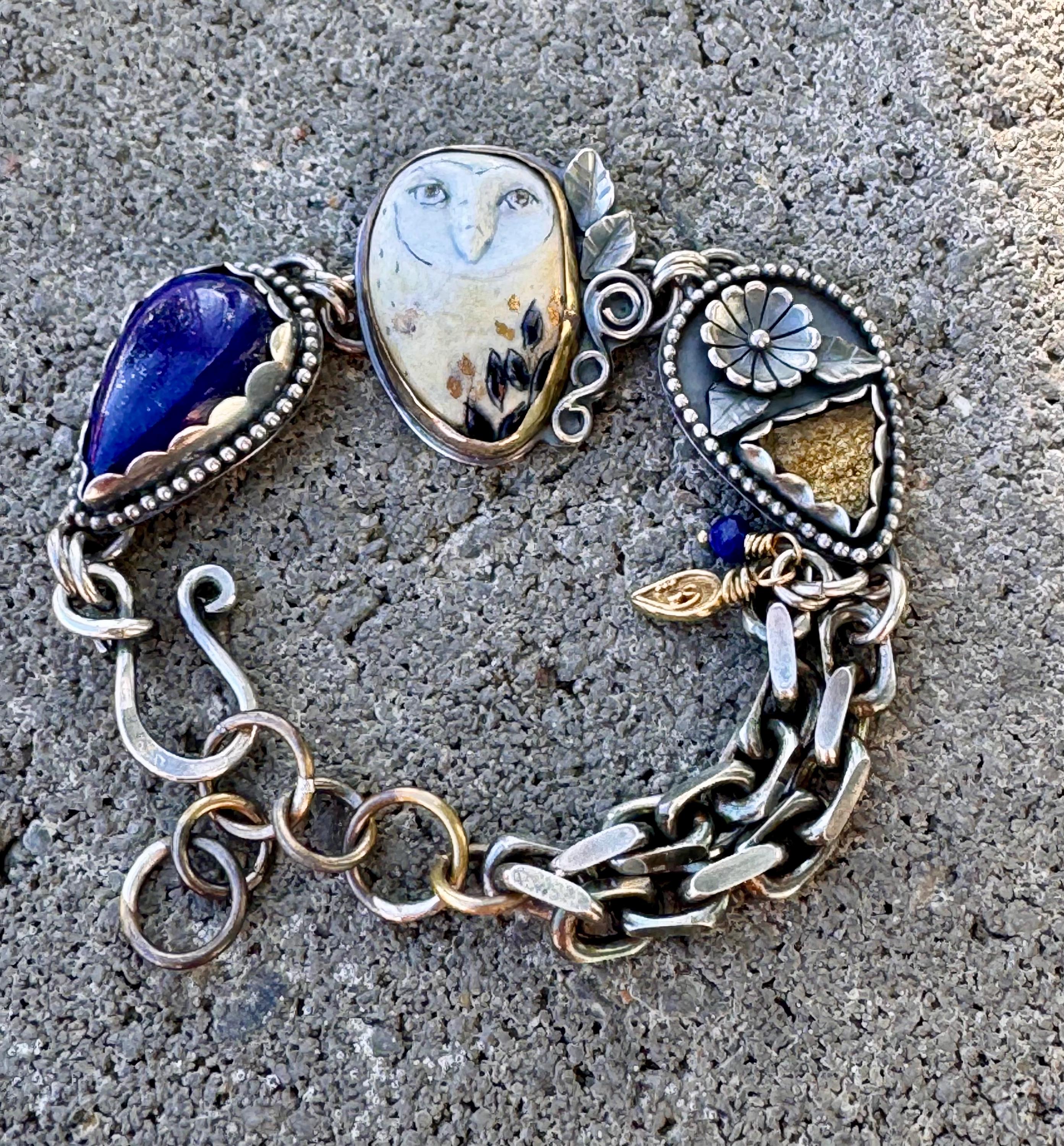 L&aacute;pis, silver, gold, and porcelain owl bracelet