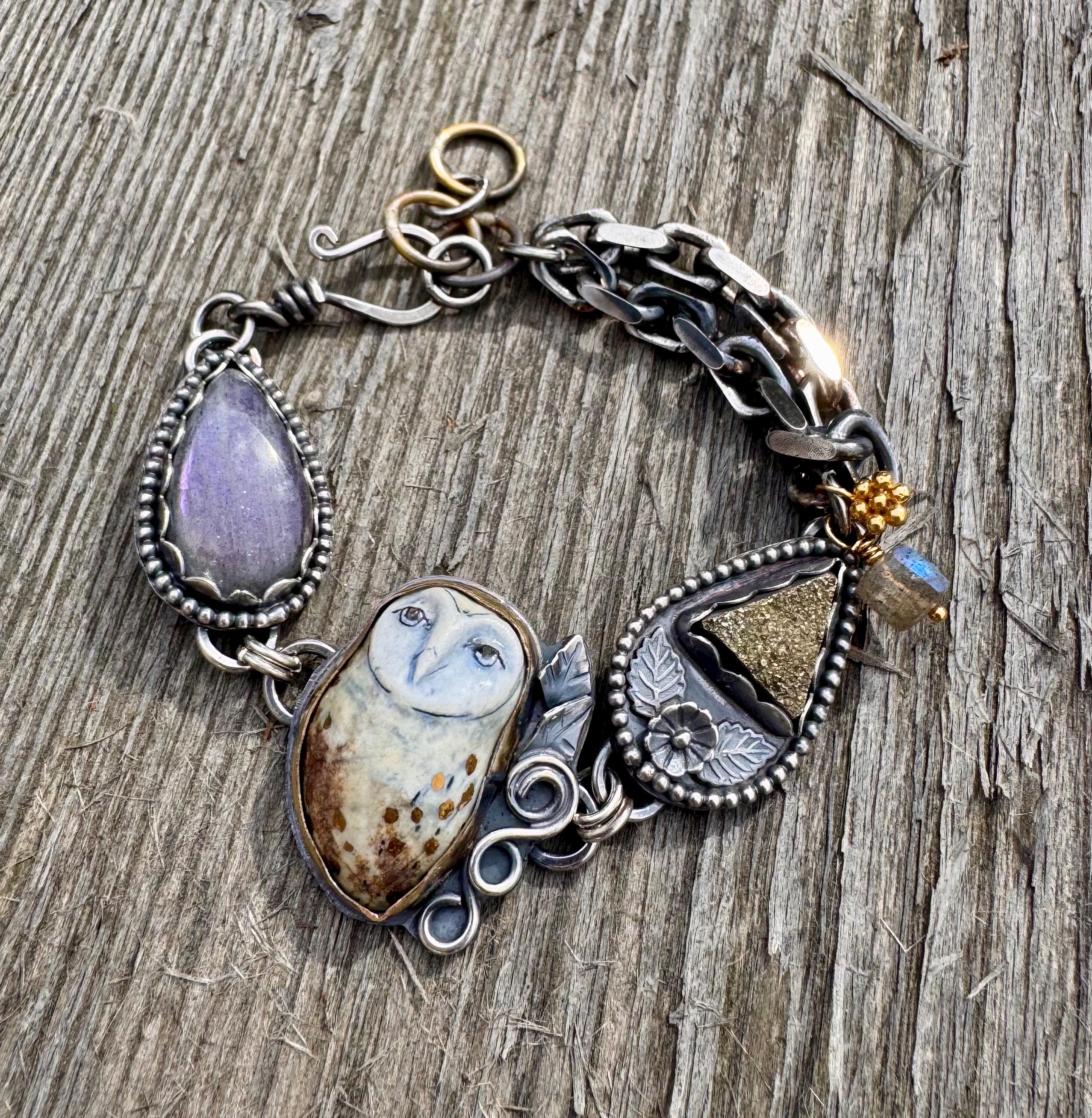 RESERVED.             L&aacute;pis, silver, gold, and porcelain owl bracelet