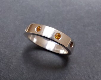 Topaz band ring