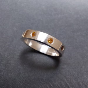 Topaz band ring