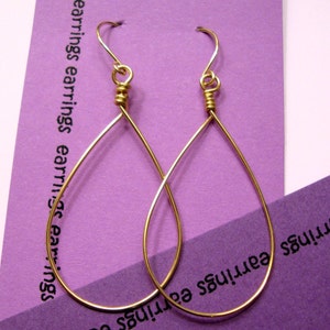 Plain Jane gold hoop earrings image 1