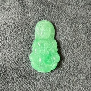 Green jade Guan Yin pendant