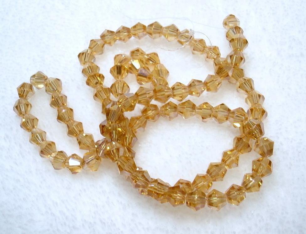 Light Gold Pink Electroplated Transparent Glass Bicone 4mm Beads Qty One Strand - B8674