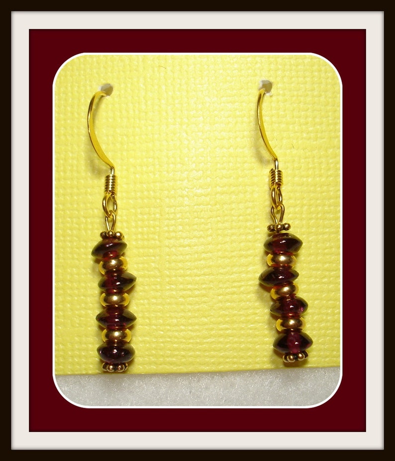Earrings with Garnets and Gold Spacer on Gold Plated Hook 23